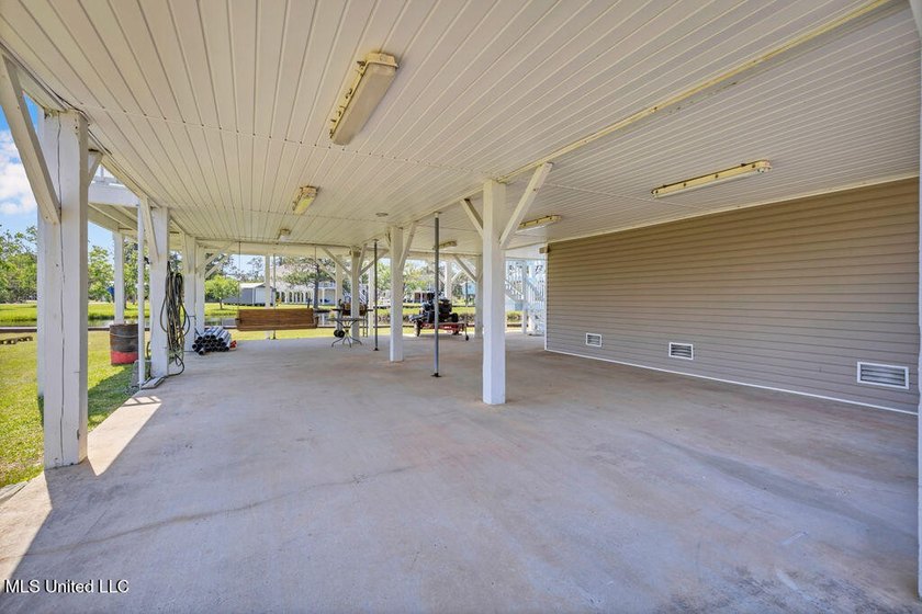 Located on a spacious waterfront lot in Bay St. Louis, this - photo 37