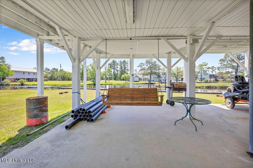 Located on a spacious waterfront lot in Bay St. Louis, this - photo 38