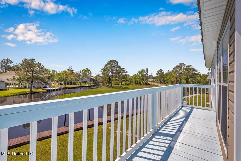 Located on a spacious waterfront lot in Bay St. Louis, this - photo 46