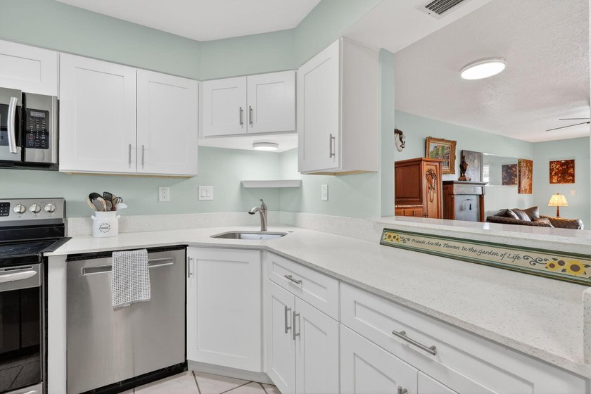 This beautifully updated 2 bedroom, 1 bath condo offers the - photo 5
