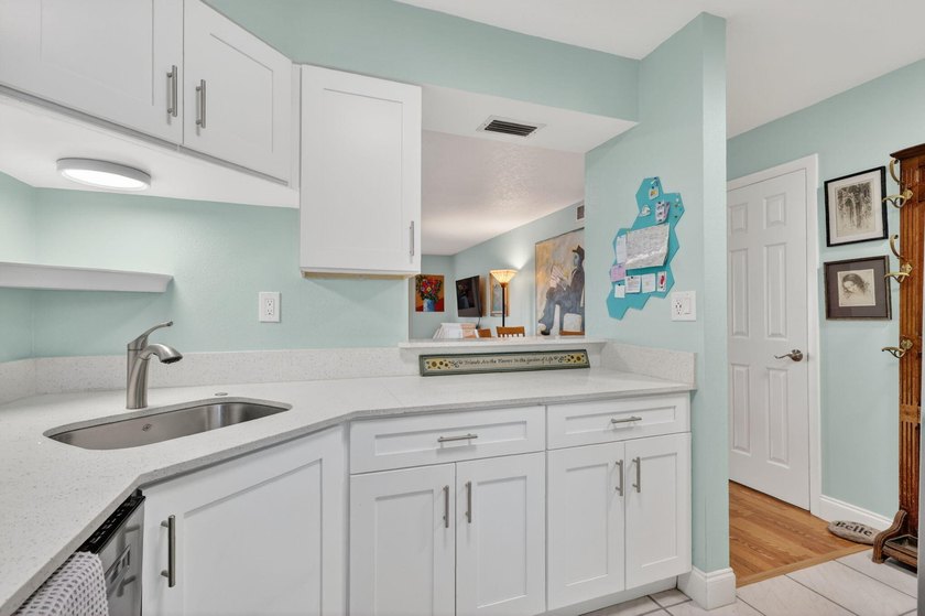 This beautifully updated 2 bedroom, 1 bath condo offers the - photo 6