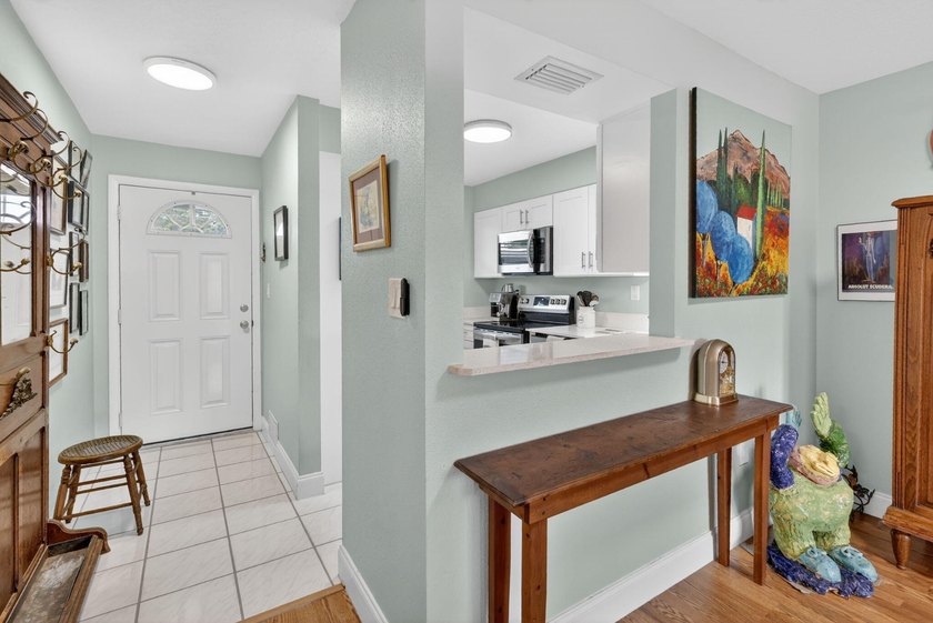 This beautifully updated 2 bedroom, 1 bath condo offers the - photo 7