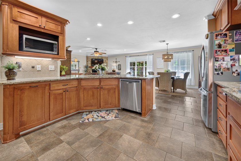 Located on three premium wooded lots in the gated community of - photo 8