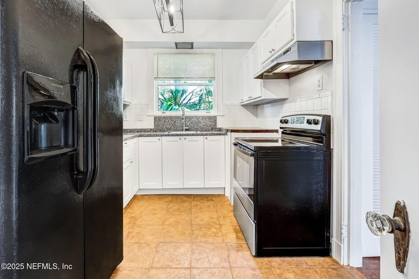 Gorgeous riverfront property with the perfect blend of historic - photo 10