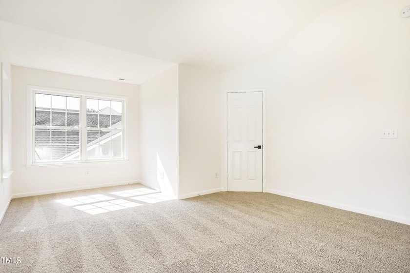 This fully refreshed 4-bedroom, 2.5-bath home with a 2-car - photo 2