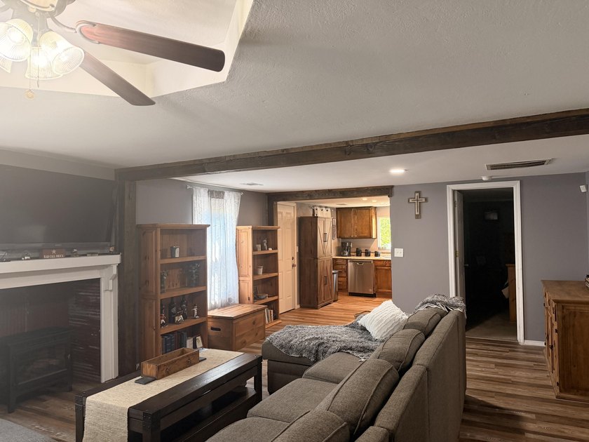 Completely remodeled and move-in ready, this quaint home blends - photo 2