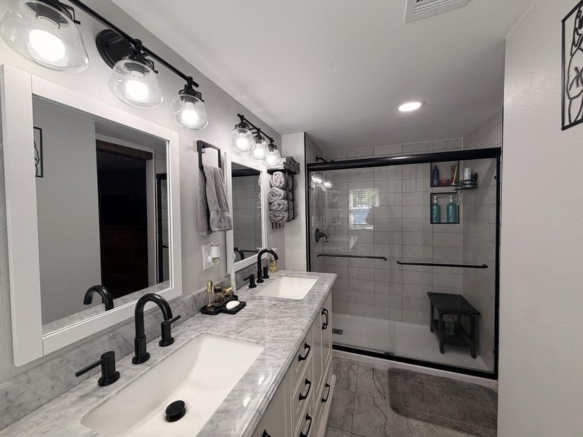 Completely remodeled and move-in ready, this quaint home blends - photo 4