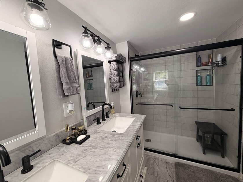 Completely remodeled and move-in ready, this quaint home blends - photo 5