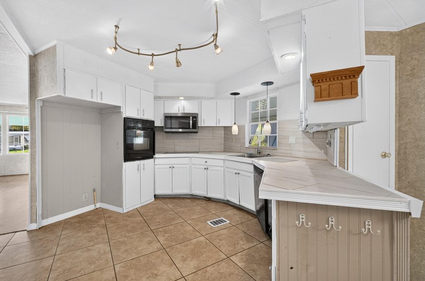 Active 55+ community with 3 pools and clubhouses, Tennis - photo 20