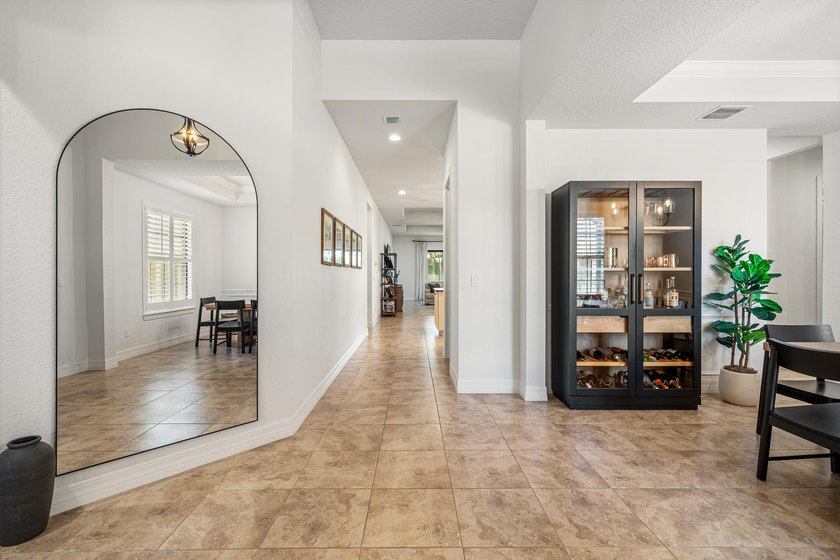 This exceptional 4-bedroom, 3.5-bath home showcases a - photo 6