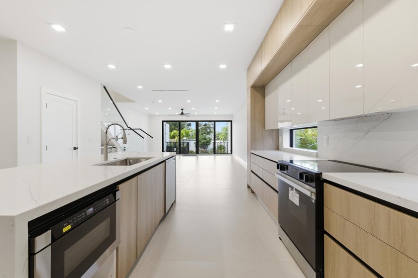 A refined new construction residence in historic Sailboat Bend - photo 14
