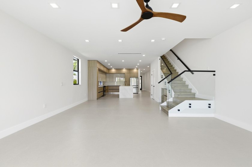 A refined new construction residence in historic Sailboat Bend - photo 18