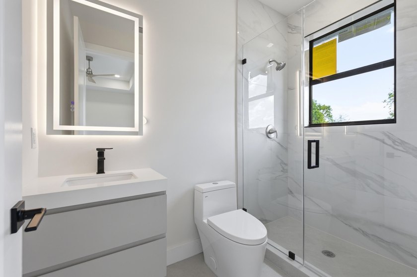 A refined new construction residence in historic Sailboat Bend - photo 32