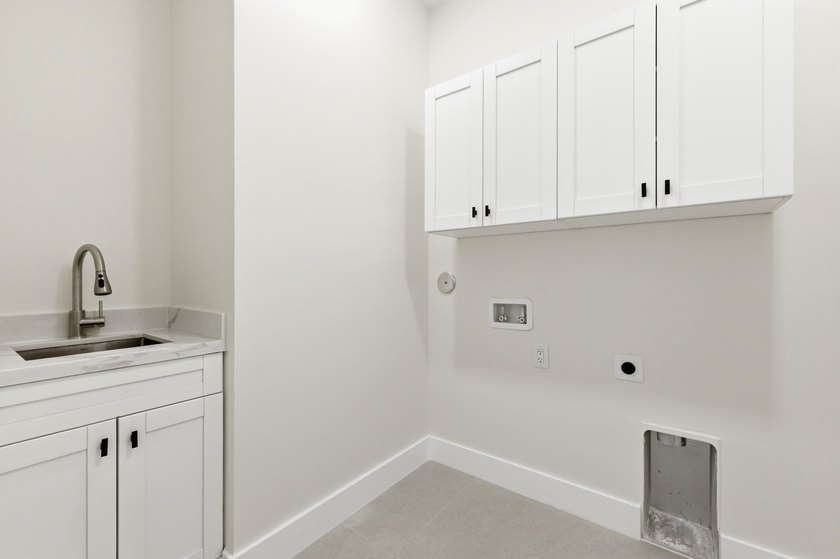 A refined new construction residence in historic Sailboat Bend - photo 33