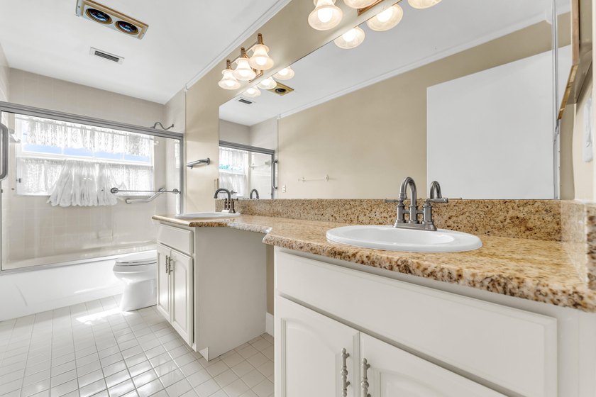 Step into this beautifully bright and spacious corner lot home - photo 17