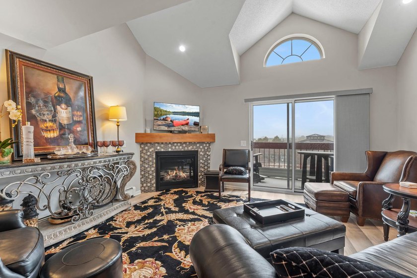 Experience maintenance-free living in this stunning, west-facing - photo 4