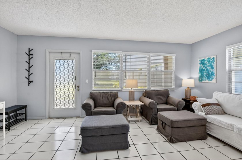 Bright and beautifully updated, this first-floor corner - photo 7