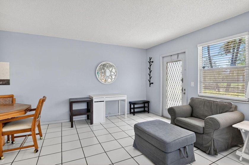 Bright and beautifully updated, this first-floor corner - photo 8