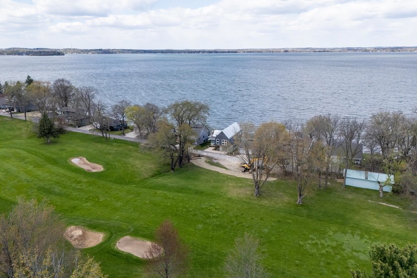 Lakefront luxury meets architectural distinction in this - photo 2