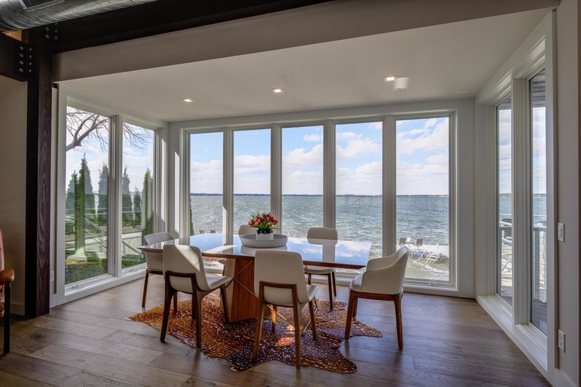 Lakefront luxury meets architectural distinction in this - photo 7