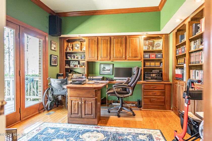 Located in the Pinehurst No. 6 neighborhood, this custom-built - photo 11