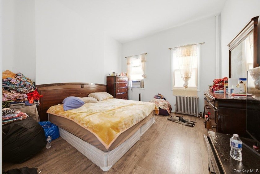 Brick 3-family home in the Grand Concourse featuring three - photo 8