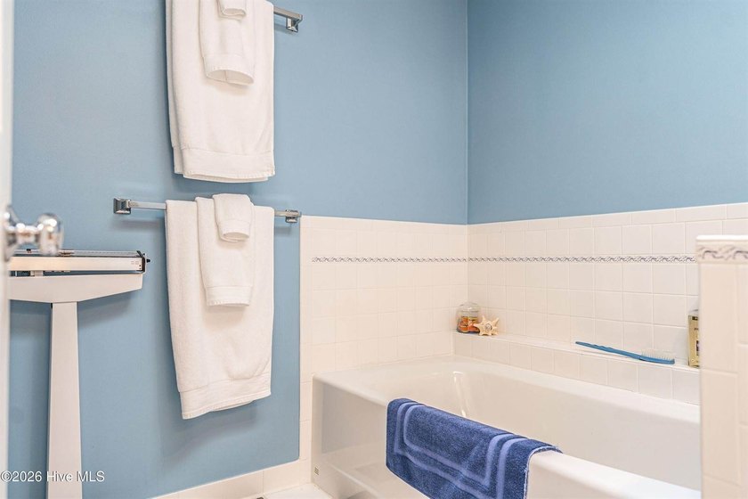 Located in the Pinehurst No. 6 neighborhood, this custom-built - photo 36