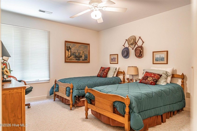 Located in the Pinehurst No. 6 neighborhood, this custom-built - photo 42