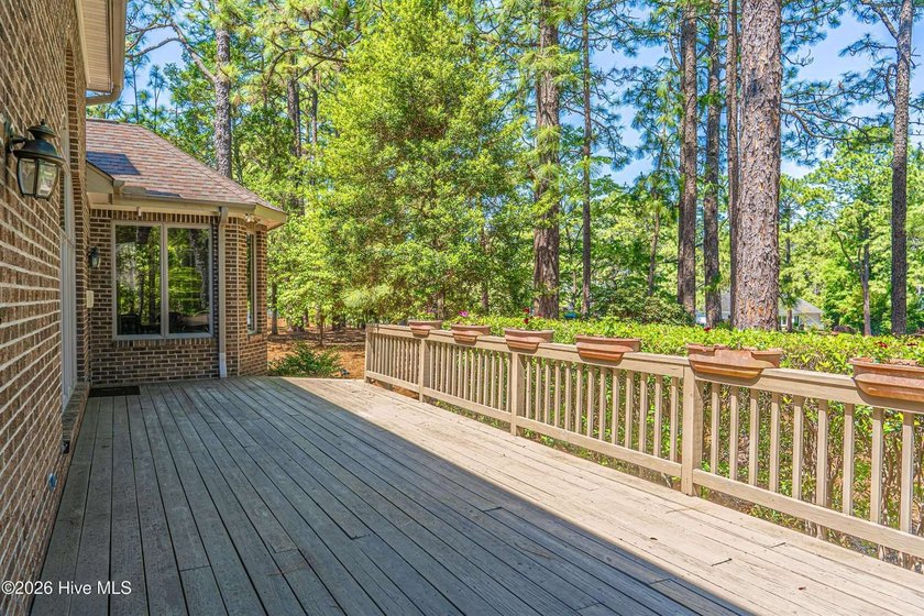 Located in the Pinehurst No. 6 neighborhood, this custom-built - photo 47