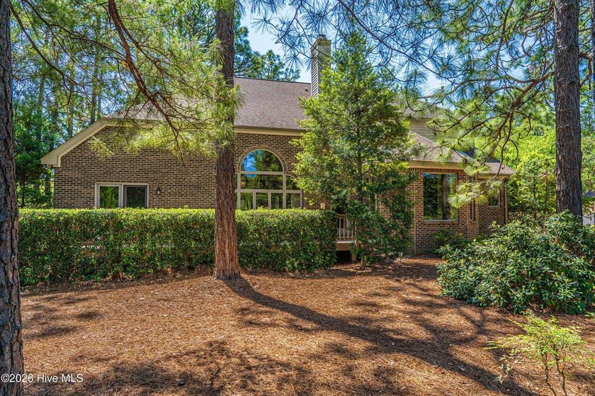 Located in the Pinehurst No. 6 neighborhood, this custom-built - photo 50
