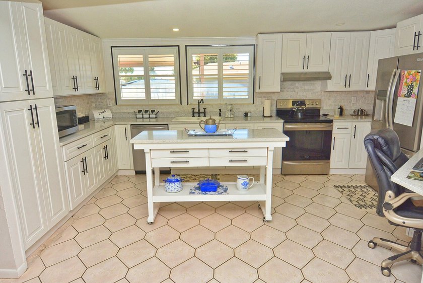 LAND OWNED! Spectacular 3-bedroom, 2-bath home with sweeping - photo 11