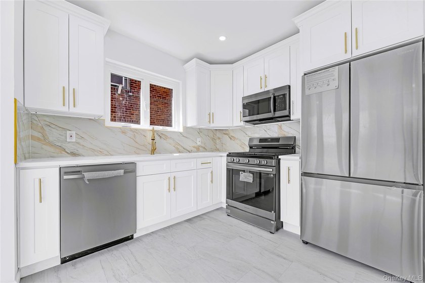 5618 Sylvan Avenue, a fully renovated all-brick home in the - photo 12