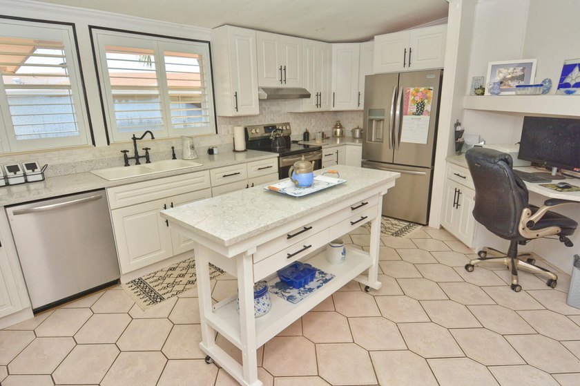 LAND OWNED! Spectacular 3-bedroom, 2-bath home with sweeping - photo 12