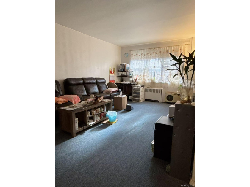 Located just a 2-minute walk from Queens College, this property - photo 4