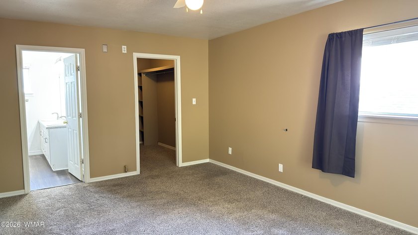 Welcome to this spacious 4-bedroom, 3-bath home in the desirable - photo 12