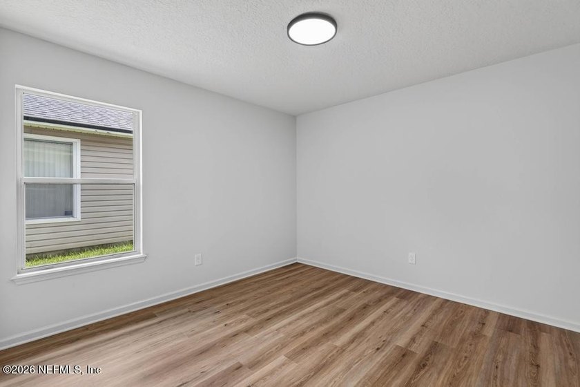 Beautifully renovated 3-bedroom, 2-bath home with a 2-car garage - photo 22