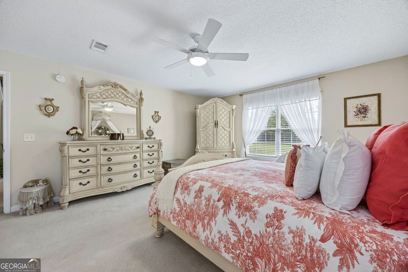 As you arrive at this Baytown-style home, you're welcomed by a - photo 18