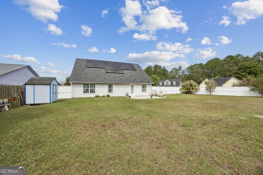 As you arrive at this Baytown-style home, you're welcomed by a - photo 31