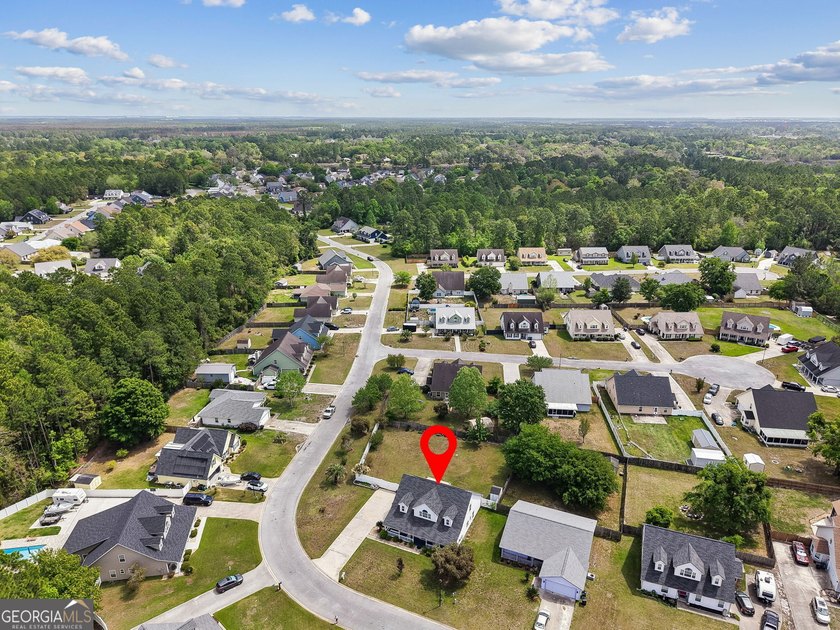 As you arrive at this Baytown-style home, you're welcomed by a - photo 37