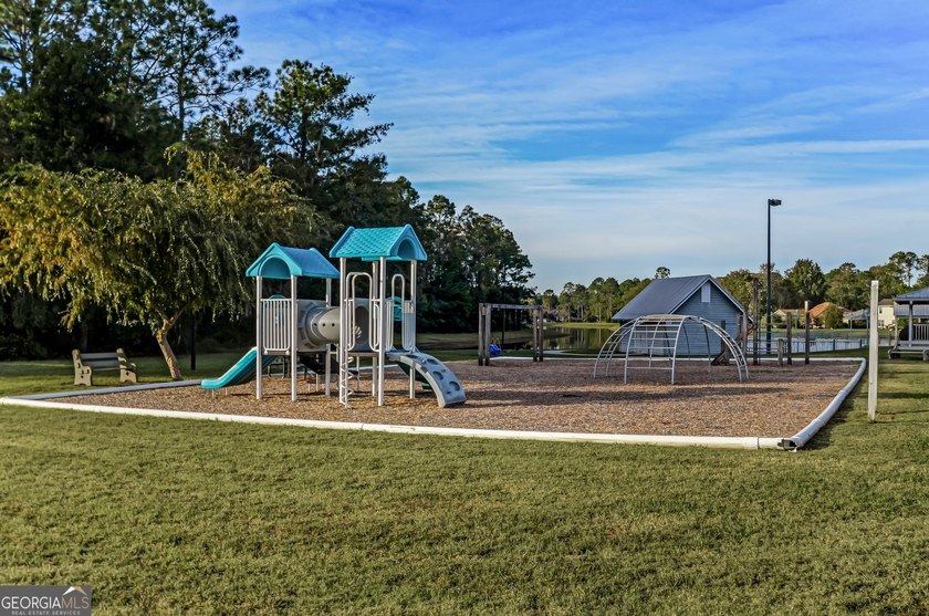 As you arrive at this Baytown-style home, you're welcomed by a - photo 50