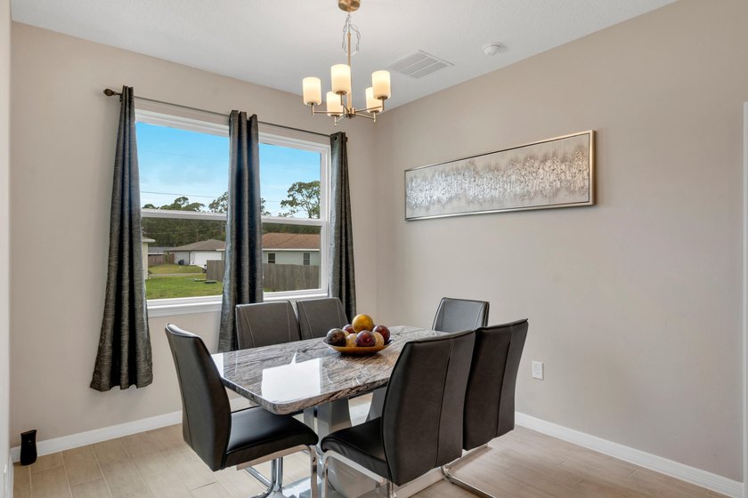 This 3-bedroom, 2-bath home with a 2-car garage was built in - photo 7