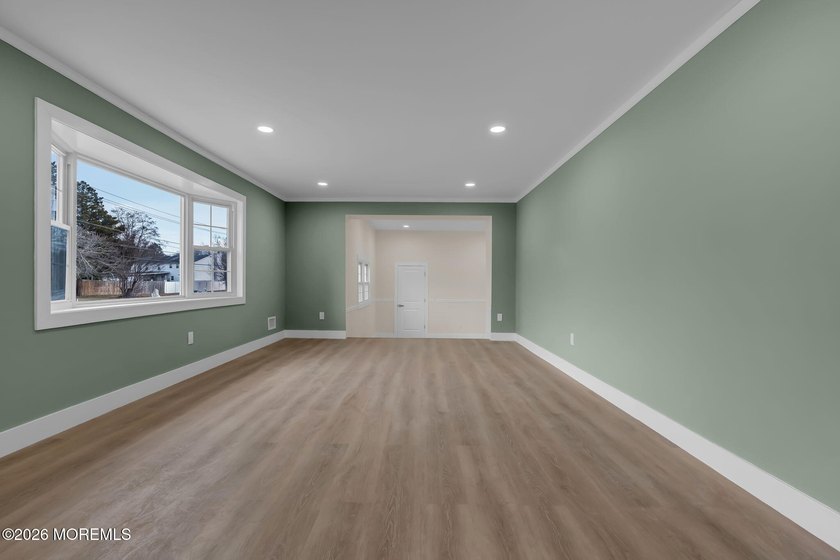 Welcome home to this beautifully remodeled ranch where modern - photo 9