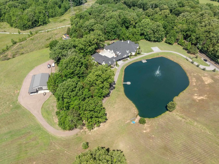 Custom estate property located on 8.67 acres in the heart of - photo 3