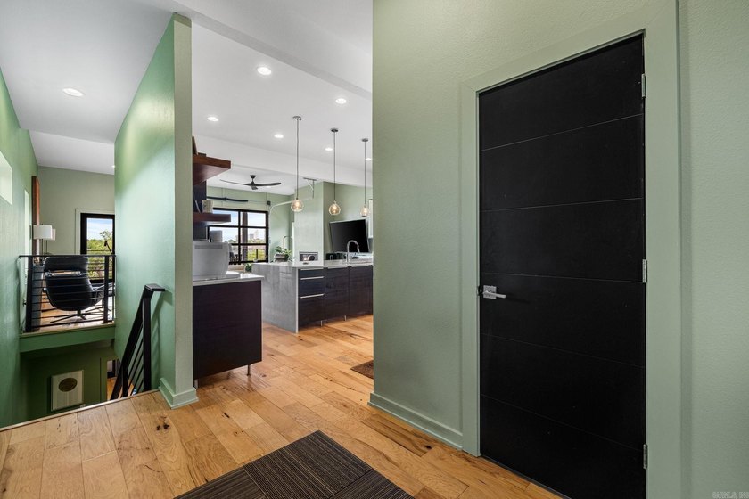 Perched above The Capitol, this contemporary retreat is designed - photo 7