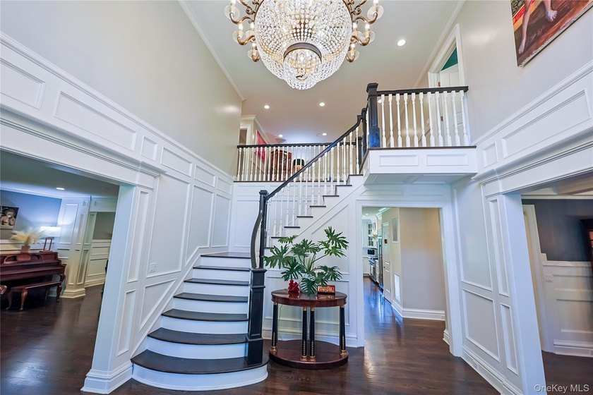 Located in the prestigious Village of Roslyn Harbor, this - photo 7