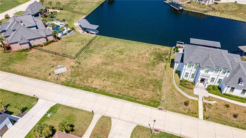 Build your dream home on this prime waterfront lot in the - photo 3