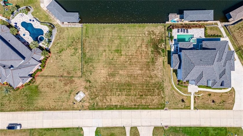 Build your dream home on this prime waterfront lot in the - photo 4