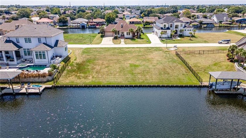 Build your dream home on this prime waterfront lot in the - photo 5