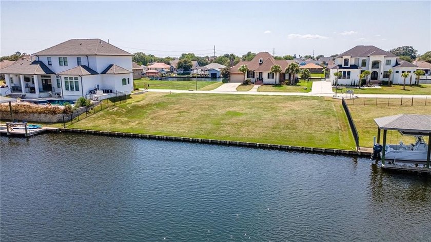 Build your dream home on this prime waterfront lot in the - photo 7