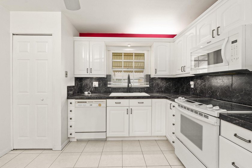Aggressively priced end-unit waterfront condo offering serene - photo 11